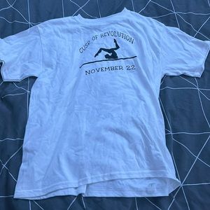 November 22 Cusp of Revolution t-shirt with gymnastics on a beam in all black